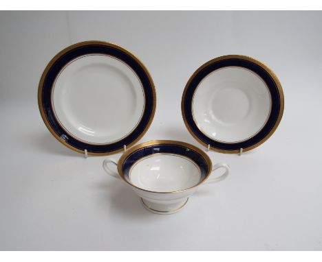 A Royal Worcester "Empire Blue" part dinner service, plates, tureens, soup bowls etc 