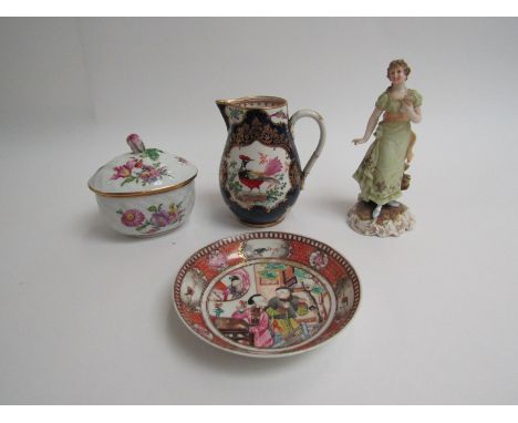 A Dresden lidded pot, Worcester style jug German figure and Oriental saucer (4)