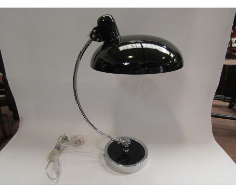 A modern adjustable desk lamp with black enamel shade, 50cm tall