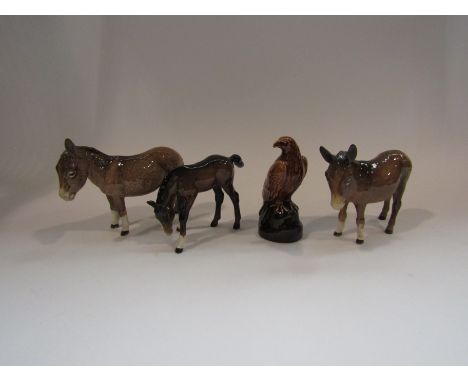 Four pieces of Beswick: two donkeys, one a/f - missing an ear, a foal and a Beneagles Scotch Whisky miniature (4)