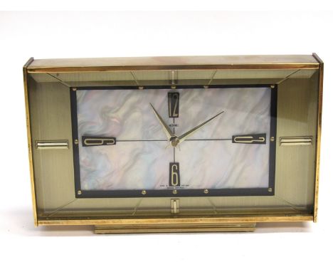 A brass cased Metamec "Self-winding" mantel clock with mother of pearl effect dial,  circa 1960's. 15cm high