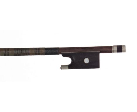 Nickel mounted violin bow, unstamped, the stick round, the ebony frog inlaid with pearl eyes and the ebony adjuster with two 