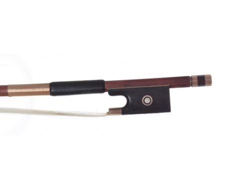 German gold mounted violin bow by and stamped *Lothar Seifert, the stick octagonal, the ebony frog inlaid with gold rings enc