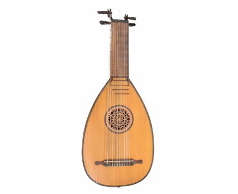 Eleven course lute, Germany, circa 1960, with thirteen ribs of maple, the table edged with a stained hardwood, the inset fret