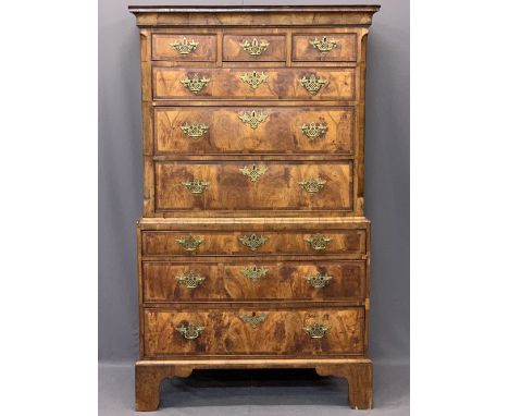 GEORGE III PERIOD WALNUT CHEST ON CHEST having a shaped cornice over an arrangement of three small, three long and three long