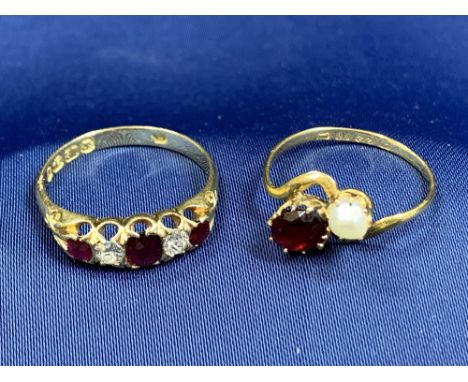 22 &amp; 18CT GOLD DRESS RINGS (2) - the 22ct example has a crossover setting holding a single Ruby and a single Baroque pear