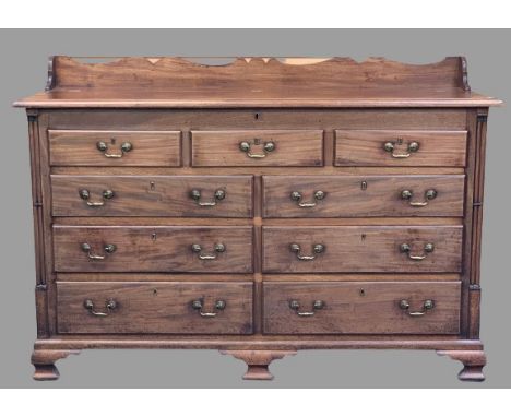 GEORGE III MAHOGANY LANCASHIRE MULE CHEST having a shaped railback to the top and lift-up lid to an open interior with candle