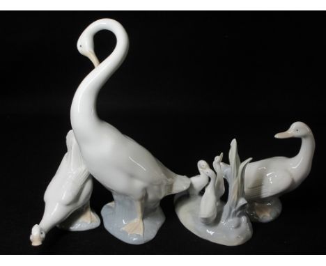 NAO - two Nao geese, a group of three on an oval base and a large single preening goose, 24cms H