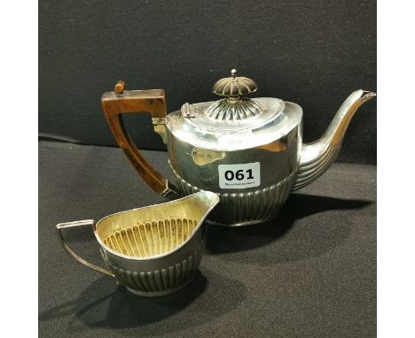 SILVER TEAPOT AND CREAM JUG