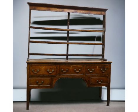 A George III open backed oak dresser, with 5 drawer base, height 193cm x 56cmSigns of woodworm particularly to left strut of 