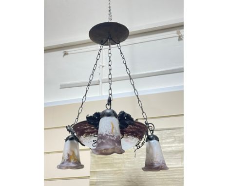 A French wrought-iron and coloured glass hanging light fitting, with central bowl and 3 pendant lights below, overall height 