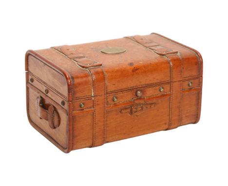 A 19th century novelty carved wood box in the form of a travelling trunk, with relief carved straps and handles, length 14cmG