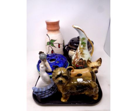 A tray containing assorted ceramics to include Cooper Craft dog ornaments, Nao figure, Spanish dancer, Maling flower bowl, co