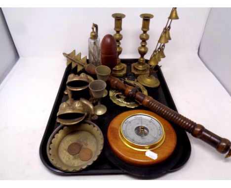A tray containing assorted brass ware to include candlesticks, horse brass and barometer mounted on a leather strap, pair of 