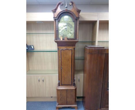 A 19th century oak eight day longcase clock with brass dial signed Barwise, Cockermouth, pendulum and weights  