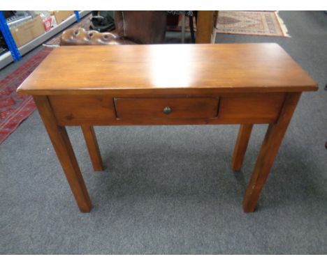 A contemporary console table fitted a drawer  