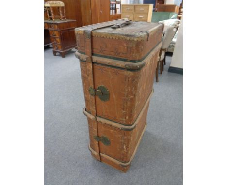 An antique bentwood bound shipping trunk 