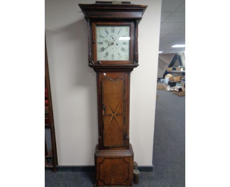 An early 19th century inlaid oak eight day longcase clock, pendulum and weights  