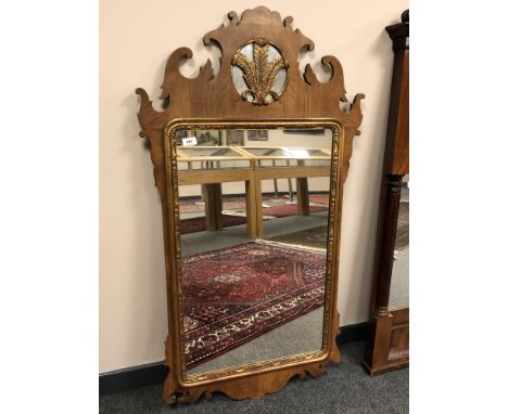 An early 20th century walnut framed Chippendale style mirror, 70 x 126 cm 