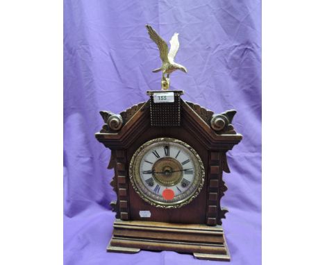 A wood framed mantel clock by Asonia Clock Co, New York with enamel face