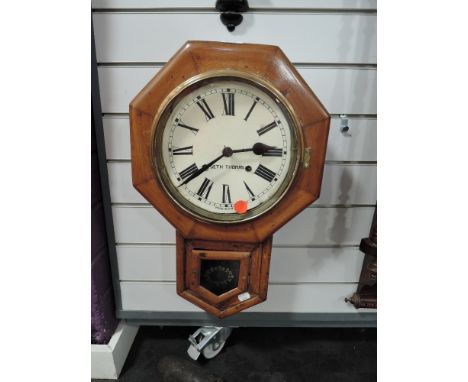 An American 8 day wall clock by Seth Thomas