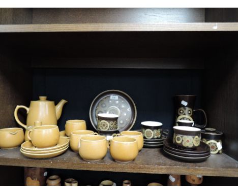A collection of retro pottery including Denby, cups and saucers, plates and more.
All pieces good including teapot and large 
