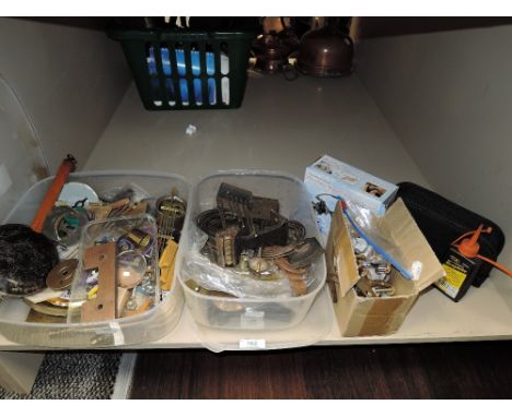 A selection of clock and watch parts and repair kits