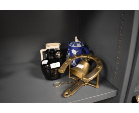 Two ceramic whiskey decanters including Dewar's and Glenturrett also a Wedgwood Jasperware teapot and brass bell