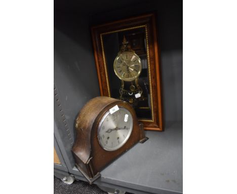 A wall mounted Louis XVI replica clock and similar Smiths mantle clock