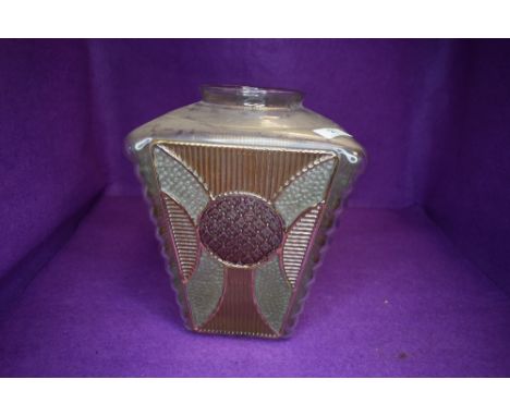 An early 20th century light shade in a lantern shape with decorated glass