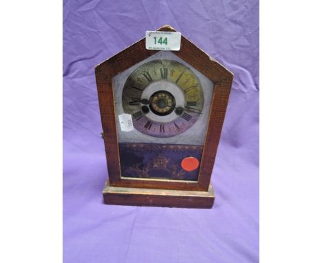 An American wood framed mantel clock