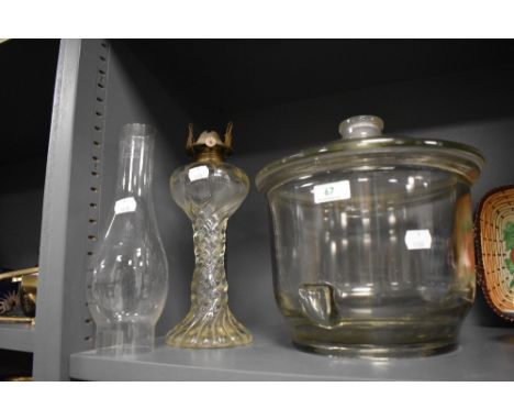 A large lidded crisp or sweet jar and a similar cut glass lamp