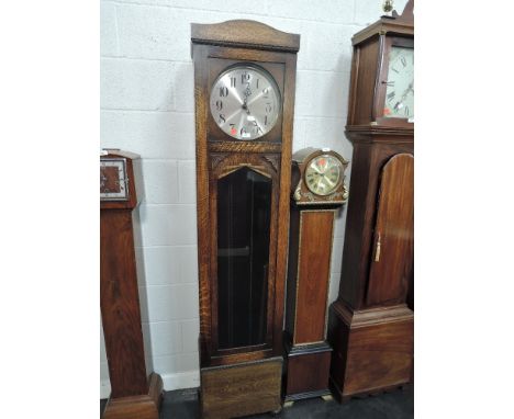 An 8 day Westminster longcase clock with German movement