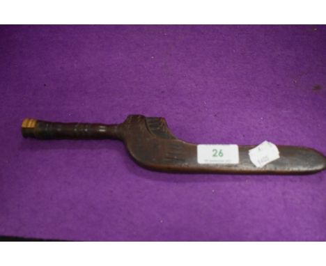 An antique knitting stick or distaff having carved decoration