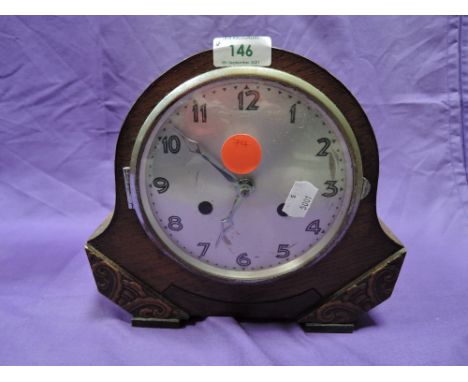A mid century 8 day mantel clock