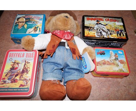 Four Western themed tins, some with contents, together with Chad Valley 'Mark the Cowboy'