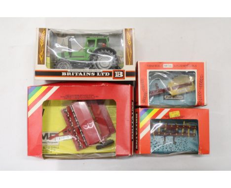 FOUR VINTAGE BRITAINS FARM ITEMS TO INCLUDE A DEUTZ-FAHR DX110 TRACTOR, A SEED DRILL, A DISC MOWER AND A CULTIVATOR - ALL AS 
