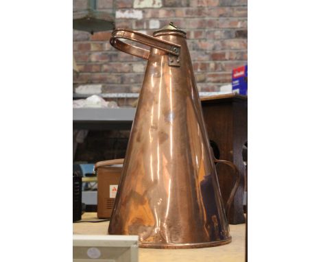 AN ARTS AND CRAFTS COPPER FLASK WITH HINGED BRASS LID AND COPPER HANDLE TO TOP AND SIDE 49 CM