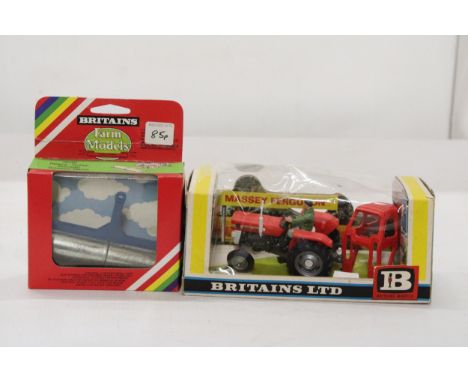 A VINTAGE MASSEY FERGUSON TRACTOR, CODE 9529 PLUS A HEAVY ROLLER, CODE 9549 - BOTH AS NEW IN BOXES