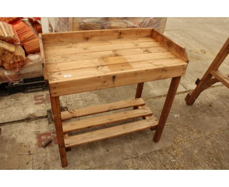AN AS NEW EX DISPLAY CHARLES TAYLOR POTTING BENCH *PLEASE NOTE VAT TO BE PAID ON THIS LOT*