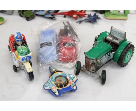 FIVE VINTAGE TIN PLATE AND FRICTION DRIVEN TOY VEHICLES TO INCLUDE, A ZETOR TRACTOR, A JAPANESE MOTORBIKE AND TWO PICKUP TRUC