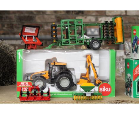 FOUR SIKU 1:32 SCALE FARM MODELS TO INCLUDE A VALTRA TRACTOR WITH KUHN EMBANKMENT MOWER (AS NEW IN BOX), A SOIL TILLAGE MACHI