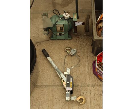 A NUTOOL HEAVY DUTY BENCH GRINDER AND A WORKZONE HAND WINCH