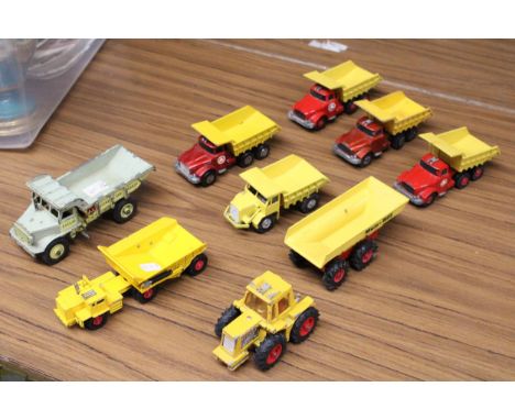 A COLLECTION OF VINTAGE MATCHBOX TOYS TO INCLUDE FOUR SCAMMELL DUMP TRUCKS, A UCKLID DUMP TRUCK, FODEN DUMP TRUCK AND A MUIR-