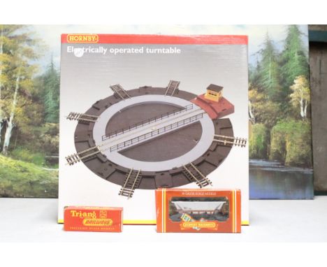 A HORNBY OO GAUGE ELECTRICALLY OPERATED TURNTABLE, A MERRY-GO-ROUND HOPPER WAGON AND A BOLSTER WAGON - ALL BOXED