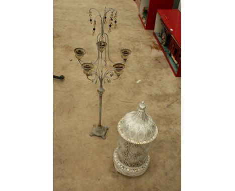 A DECORATIVE METAL TABLE LAMP, AND A CANDLESTICK