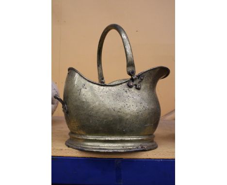 A VINTAGE BRASS HELMET COAL SHUTTLE