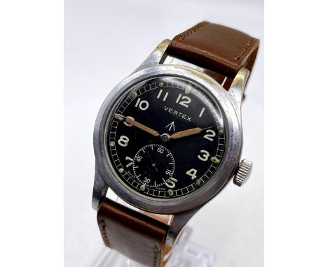 A GENTLEMAN;S VERTEX WW2 "DIRTY DOZEN" MILITARY ISSUE WRIST WATCH WITH BROAD ARROW TO DIAL AND BACK PLATE WITH WWW. WORKING A