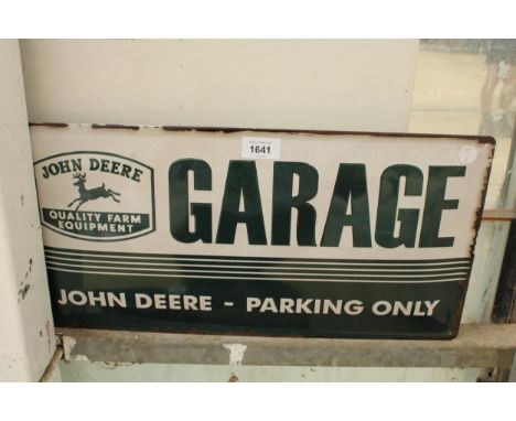 AN ENAMEL JOHN DEERE PARKING ONLY SIGN