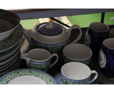 A WEDGWOOD 'WATERCOLOUR' PART DINNER SERVICE TO INCLUDE PLATES, BOWLS, A TEAPOT, CUPS, SAUCERS, A CREAM JUG AND SUGAR BOWL